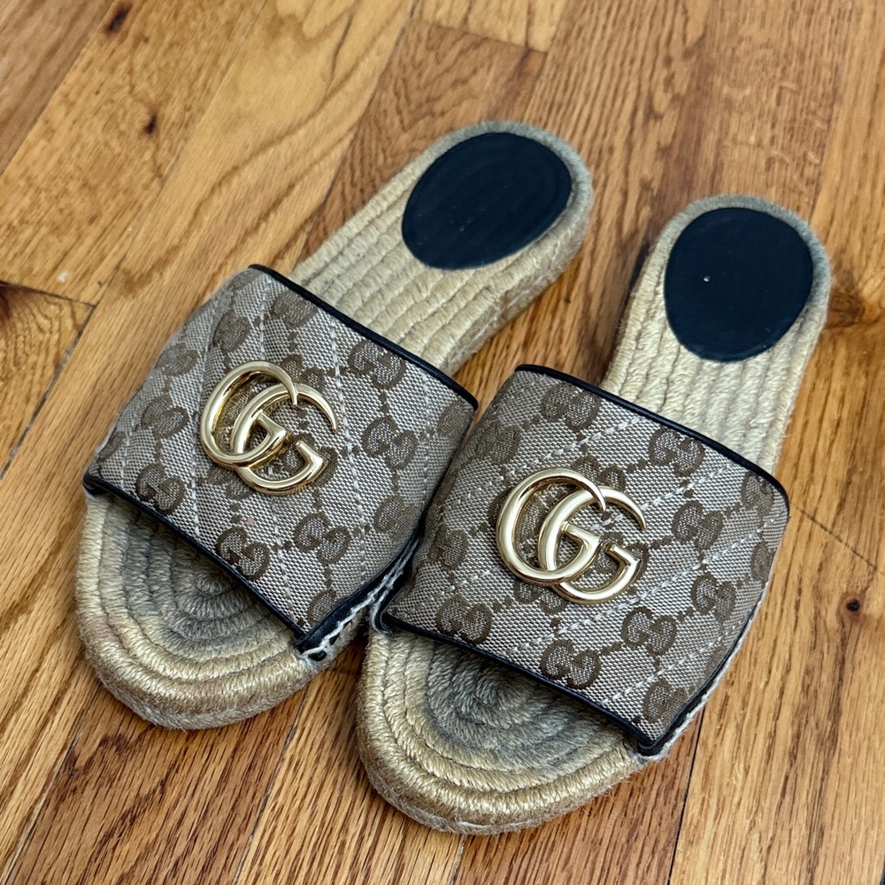 Gucci Beige Monogram Slides with Gold Emblem